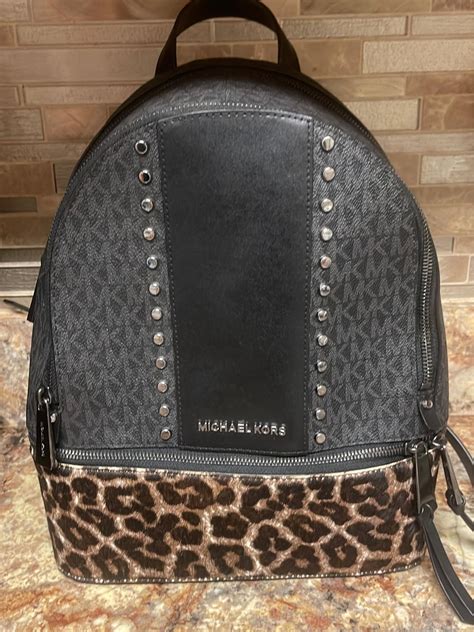 michael kors cheetah backpack.